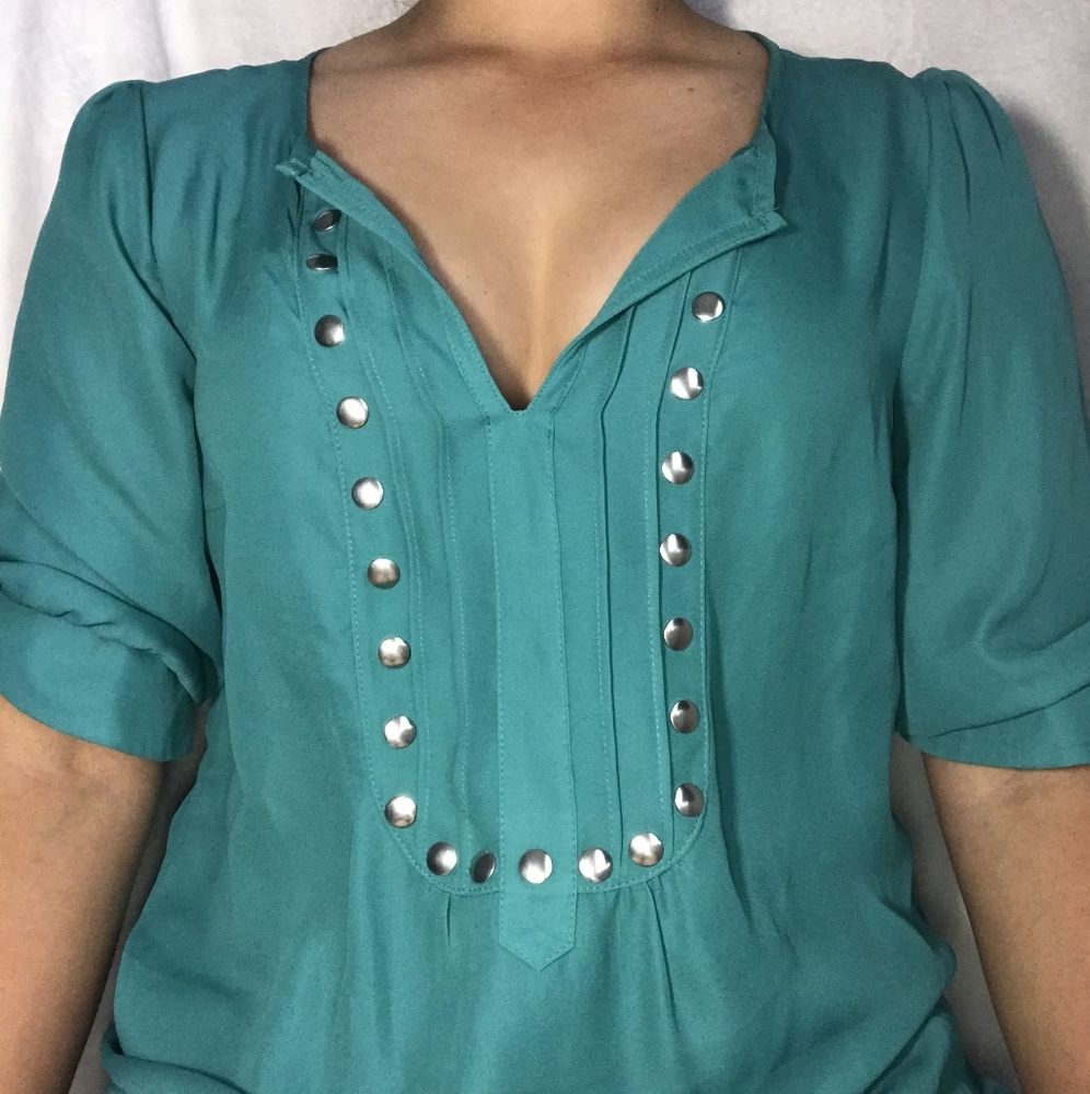 teal blouse